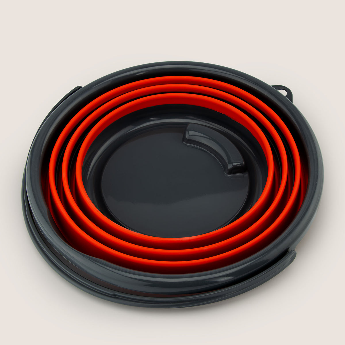The bucket folded flat into a slim disc